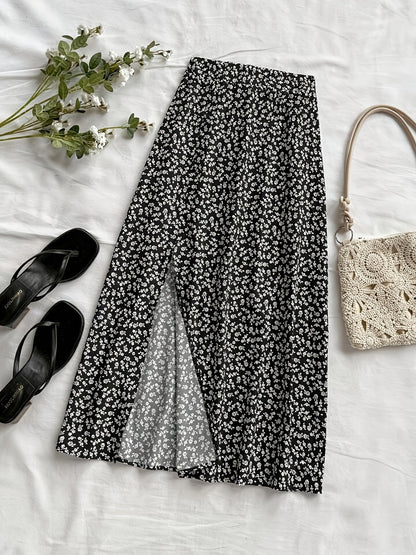 Women's midi skirt with floral pattern and slit – feminine A-line summer skirt for leisure & vacation