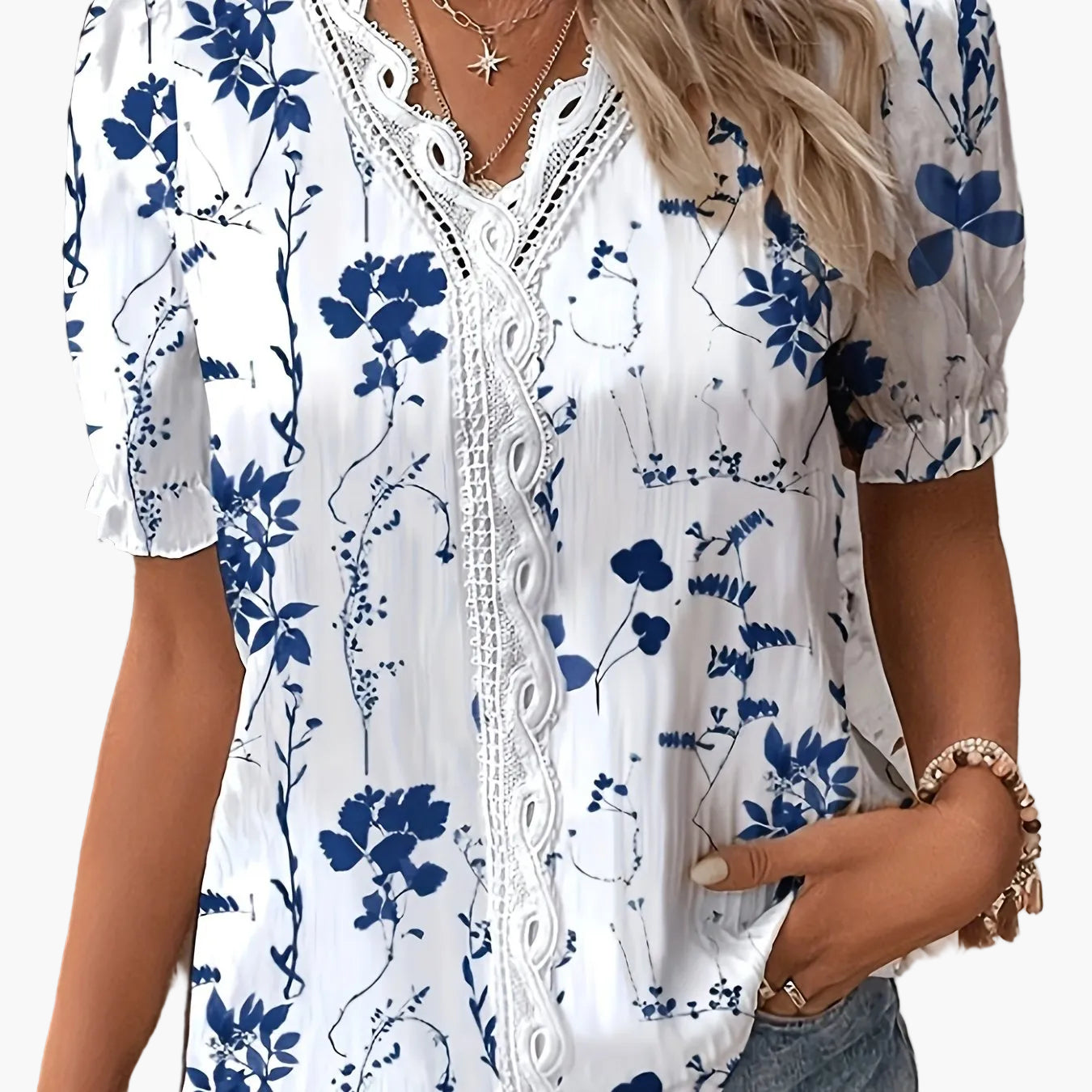 Women's blouse with V-neck and lace trim, casual summer style, floral pattern, ideal for everyday wear and leisure
