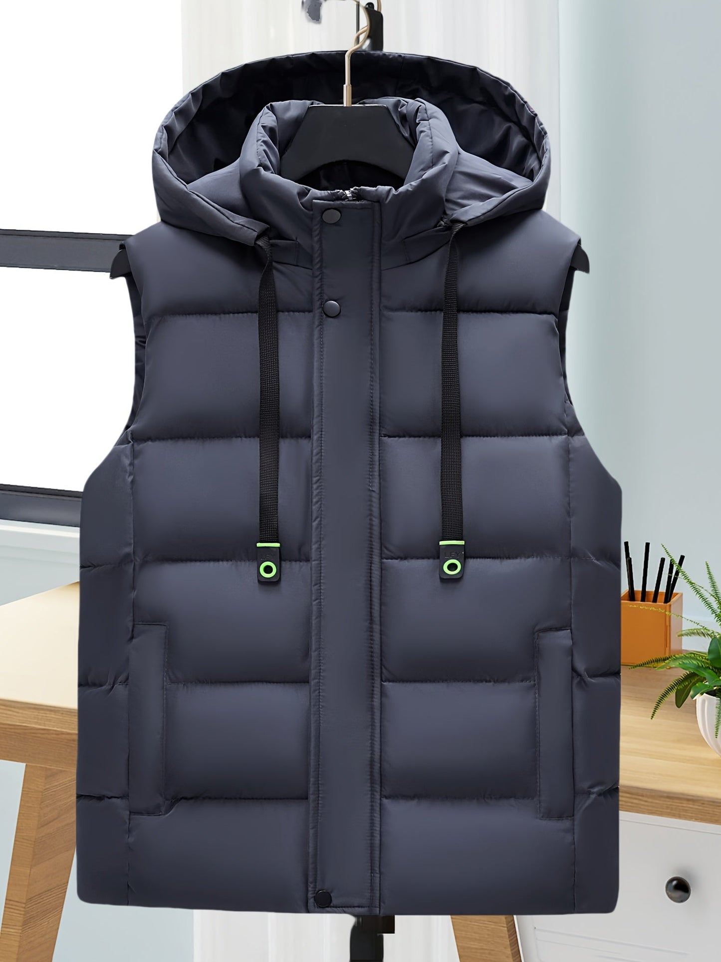Unisex hooded quilted vest with a zipper and pockets