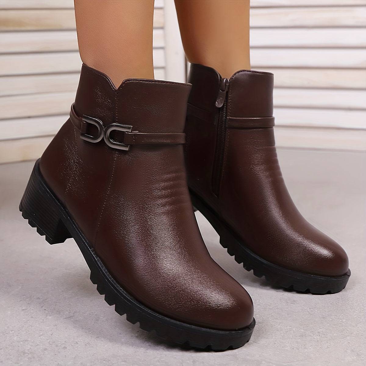 Women's ankle boots with decorative buckle and zip, lug sole, block heel