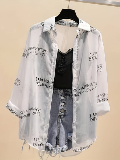 Women's blouse with newspaper print and shorts – fashionable set for leisure and everyday wear