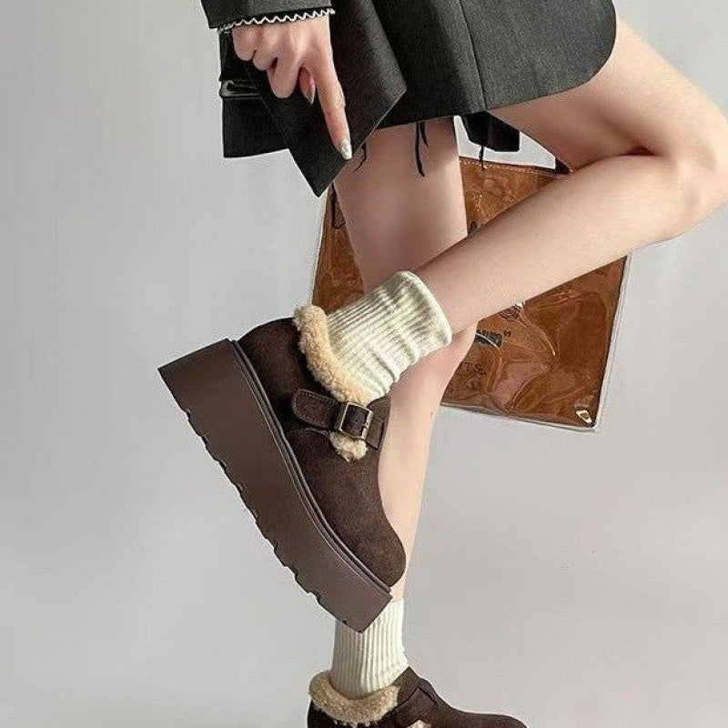Brown platform moccasins with fur lining and buckle