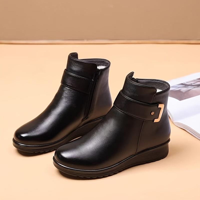 Women’s black winter ankle boots with warm lining and buckle