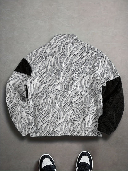Unisex fleece jacket with stand-up collar, zipper, and animal print