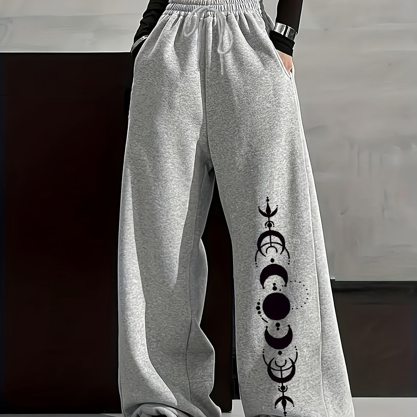 Wide-leg lounge pants with moon phase pattern, elastic waistband