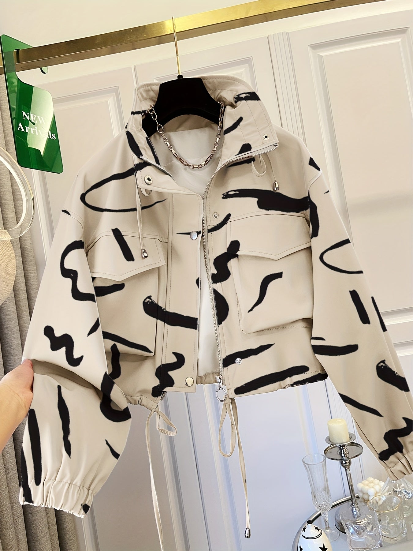 Women’s short jacket with stand-up collar and patterned print