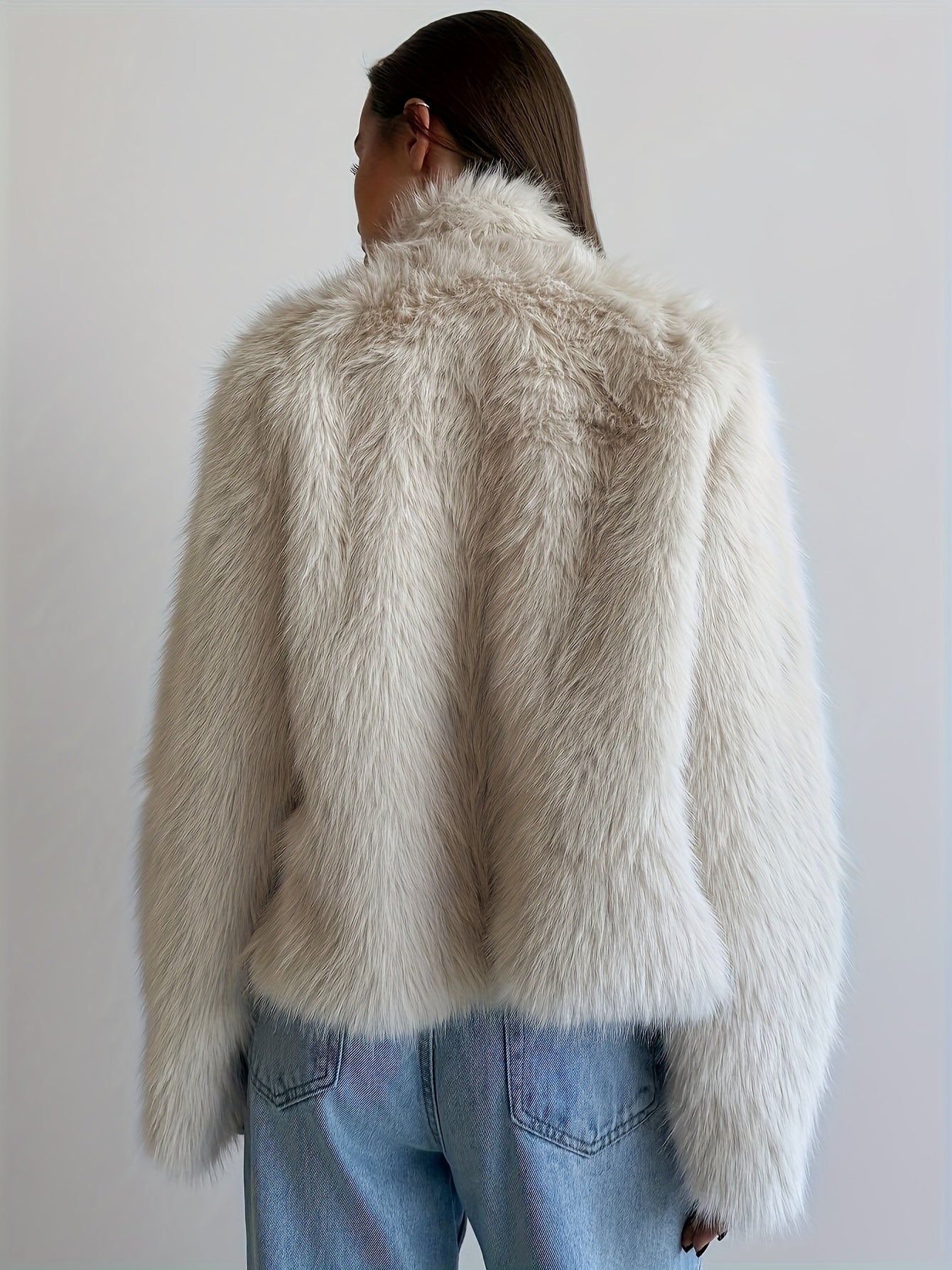 Women's beige faux fur jacket with buckles