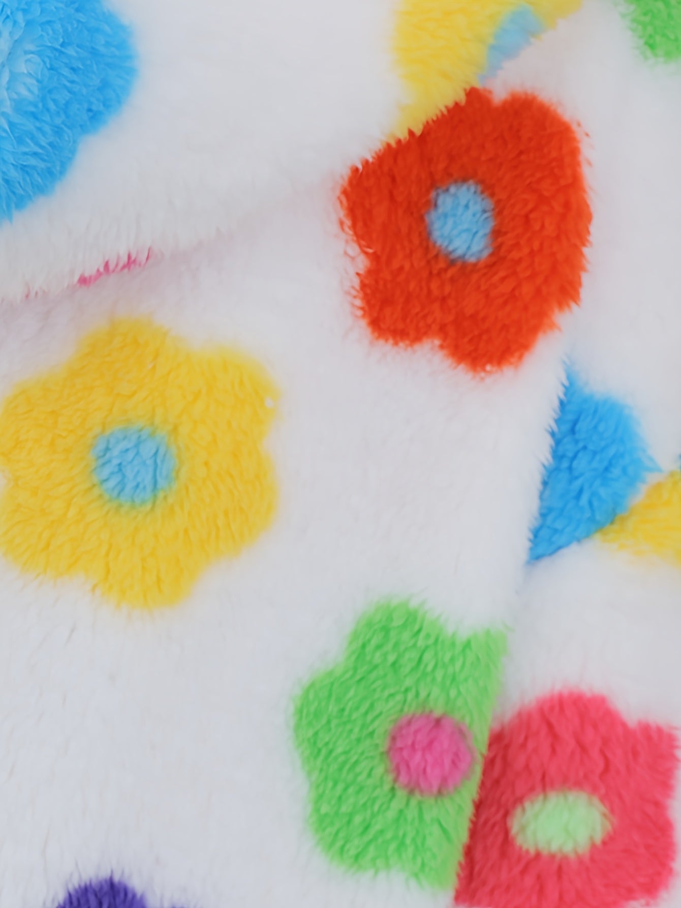 Hooded teddy jacket with colorful floral patterns and a zipper