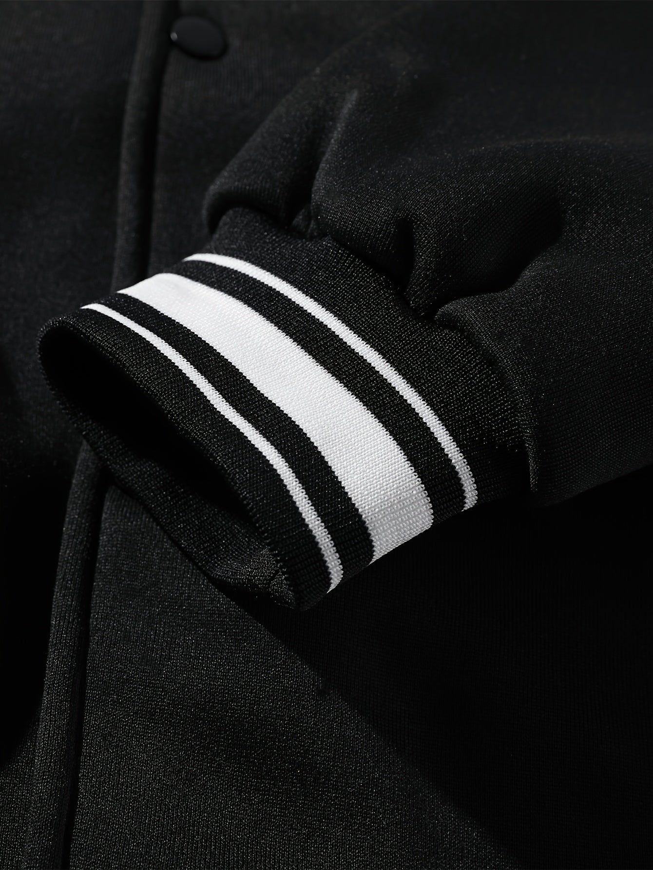 Men’s baseball jacket with hood, snap buttons, embroidery, and ribbed cuffs