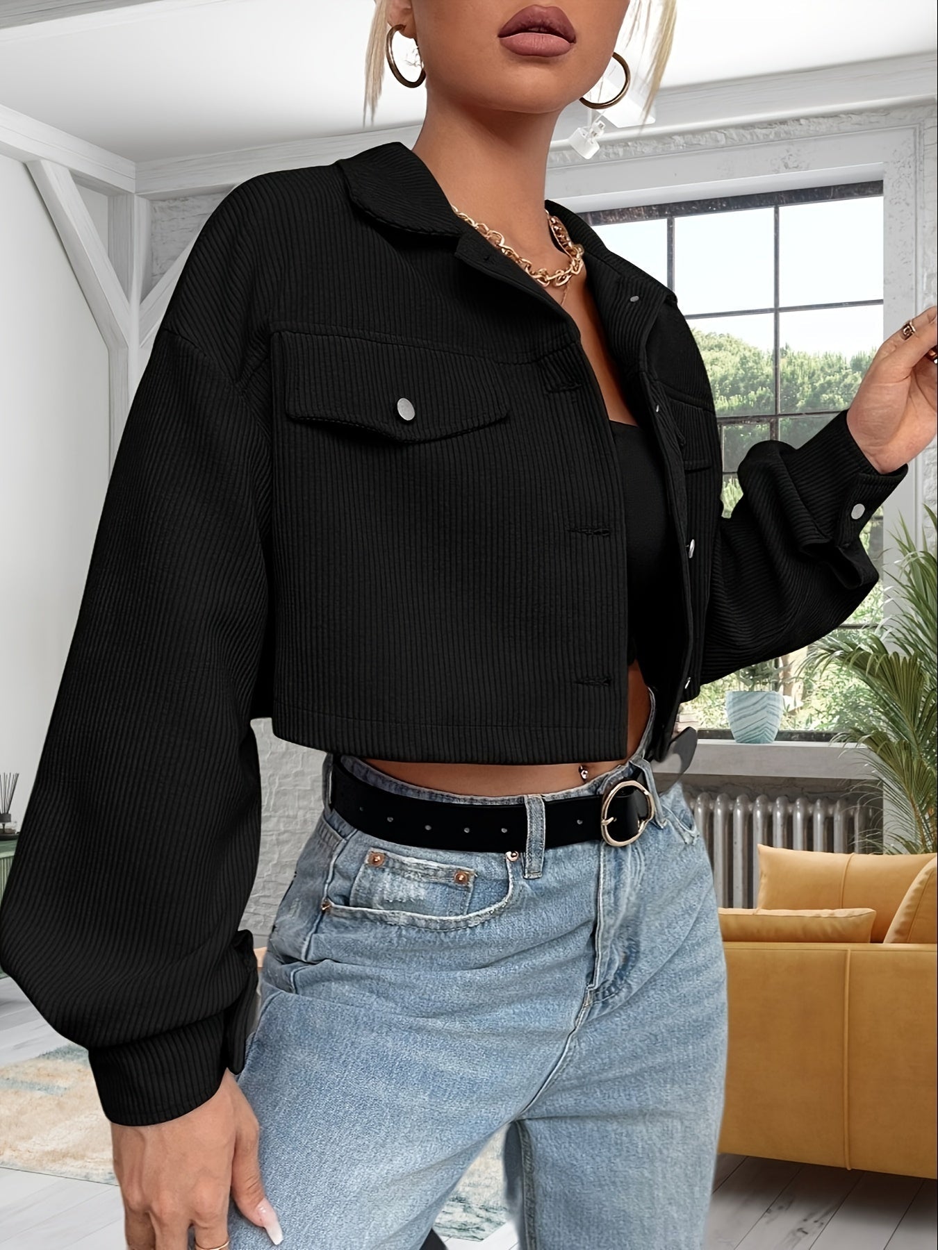 Short women's corduroy jacket with a collar and chest pockets