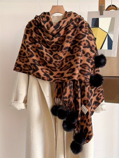 Leopard-print scarf with pom-poms
