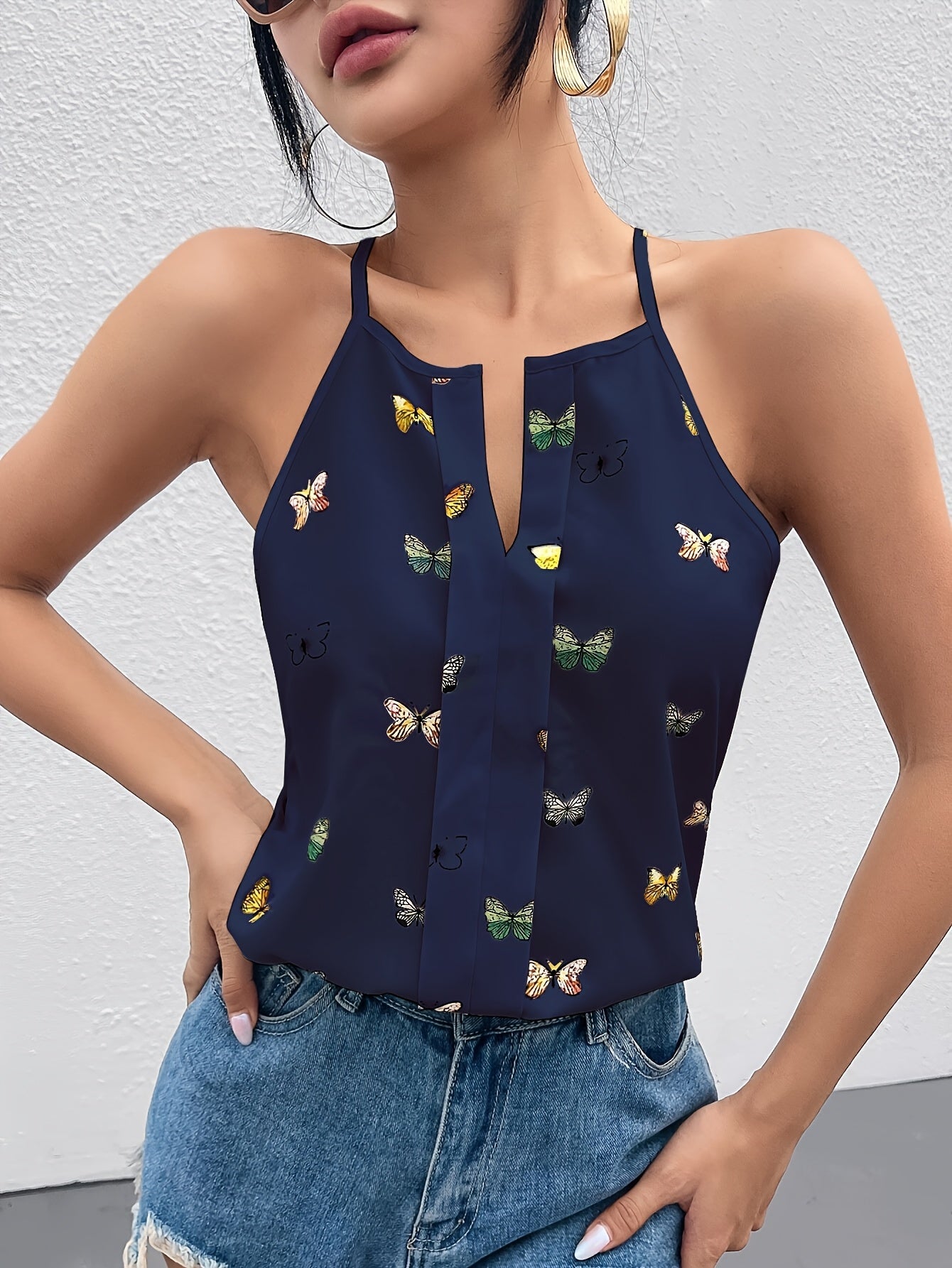 Women's top with butterfly print and spaghetti straps – Elegant summer blouse for leisure and everyday wear