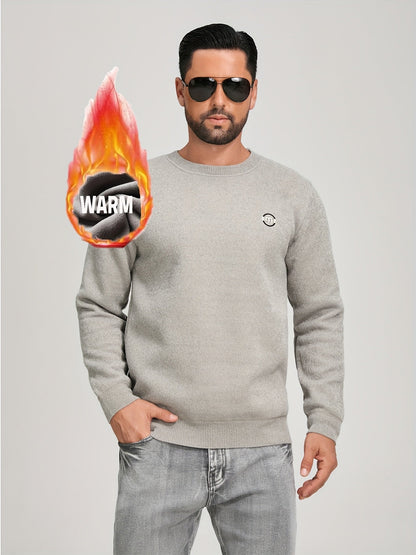 Unisex long-sleeve pullover with a crew neck and ribbed cuffs, lined