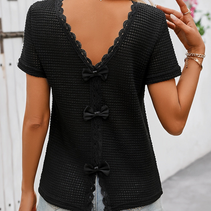 Women's short-sleeve top with lace back cutout and bow – feminine style for casual wear and summer