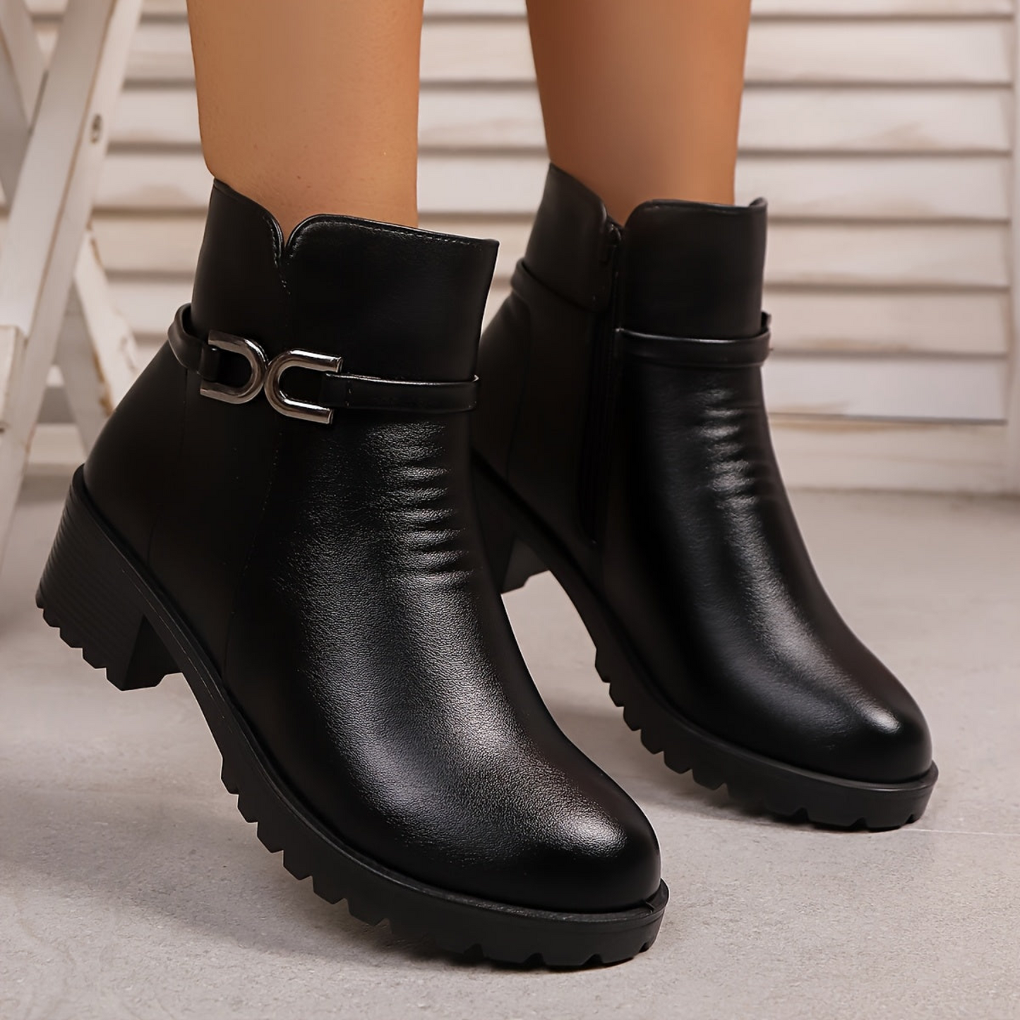 Women's ankle boots with decorative buckle and zip, lug sole, block heel