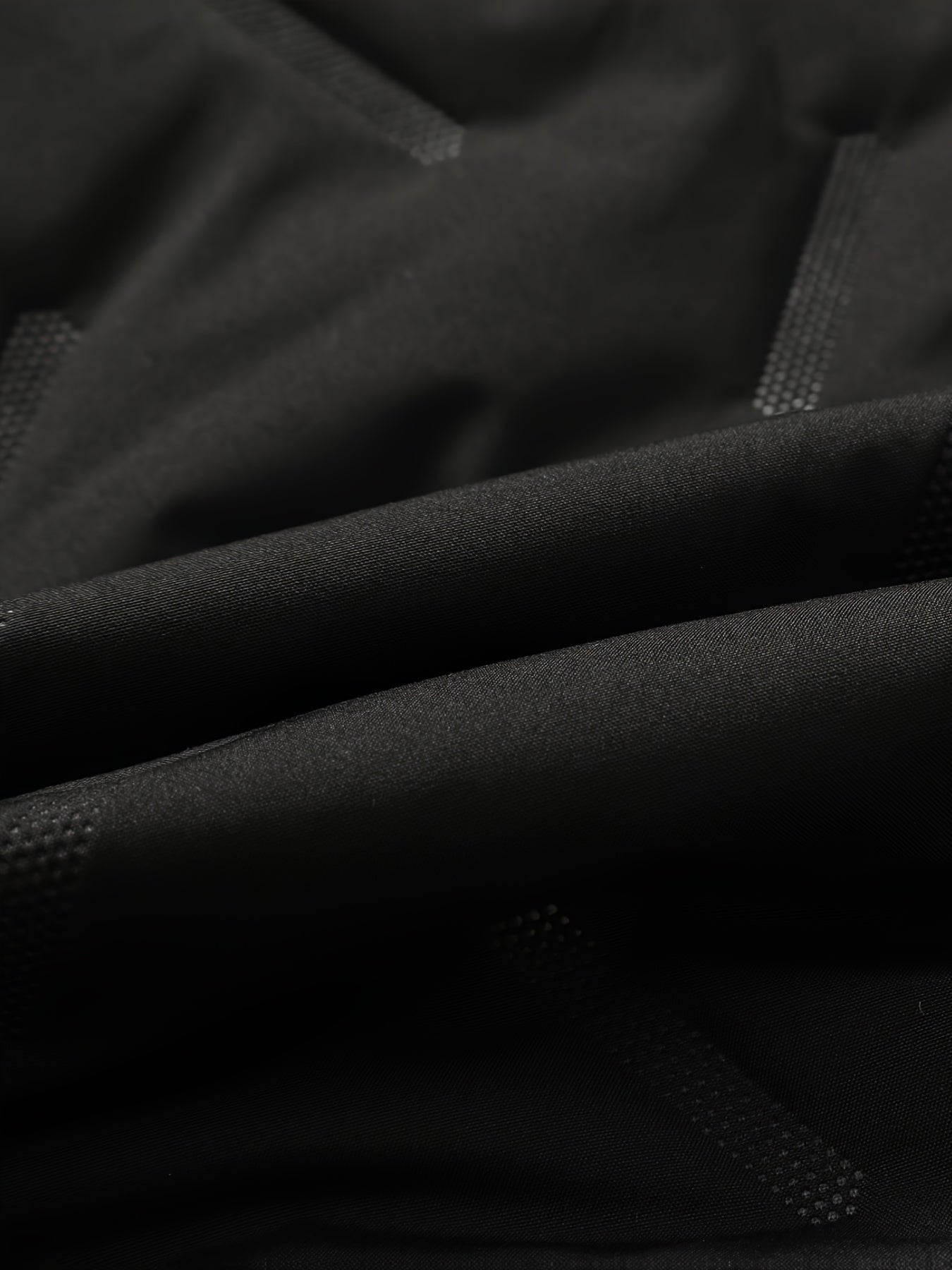 Padded men's vest in black with a hood and plush lining