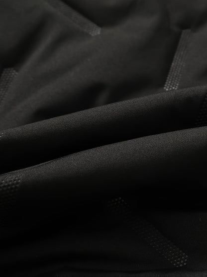 Padded men's vest in black with a hood and plush lining
