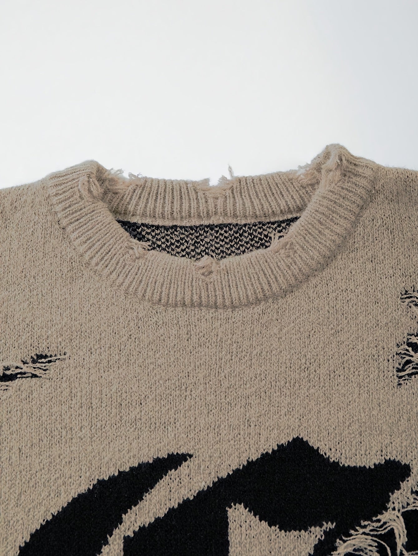 Unisex distressed pullover with a crew neck and statement print
