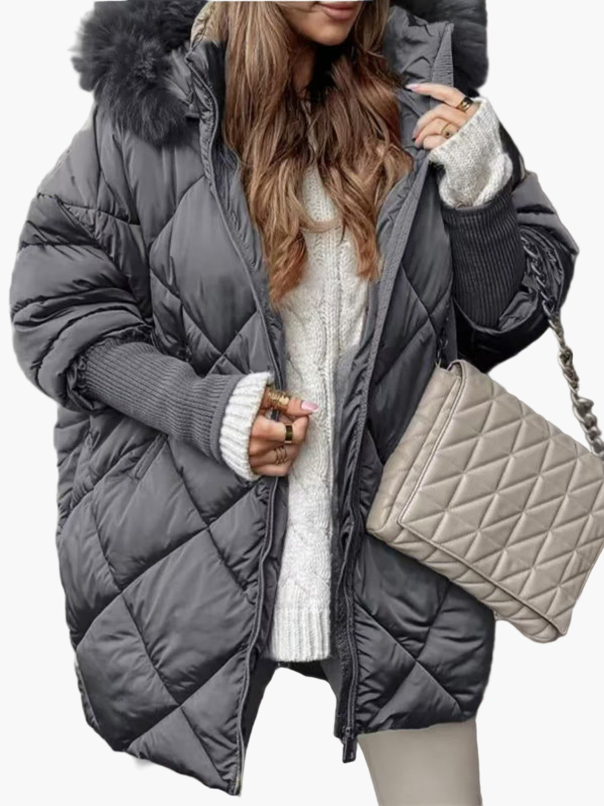 Women's winter quilted jacket with hood and oversize look – fashionable outdoor jacket for cold days